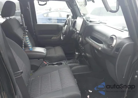 2011 Jeep Wrangler Unlimited Sport z USA, uszkodzony, nr VIN 1J4BA3H1XBL530251